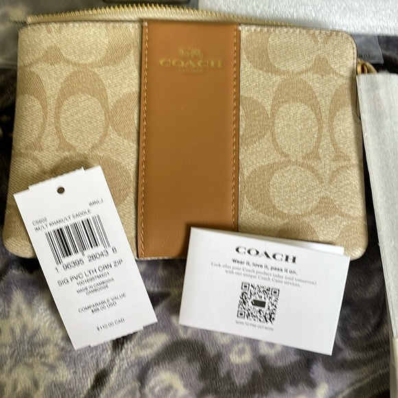 Coach Handbags - Light tan coach wristlet NWT
